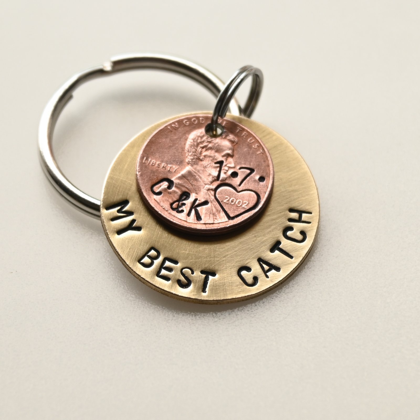 Custom stamped brass and coin layered keychain