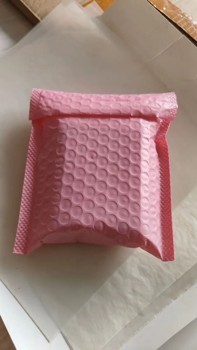 Protective mailer used for shipping a CoolKeychain order